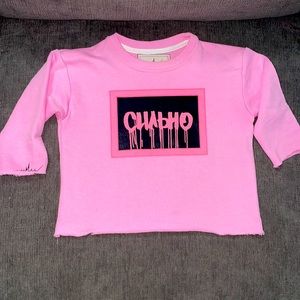 Kids pink elbow cutoff shirt. “strong” in Cyrillic +a heartbeat design on sleeve
